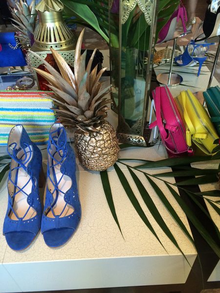 Bright heels and palm leaves