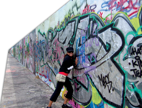 Lorraine Zander breaking down the Berlin Wall