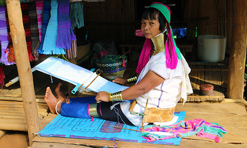 Long-Neck Karen Hill Tribe woman making a scarf