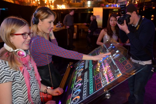Canadian artist Anastasia A checks out the  Emulator Elite at the #YOUeffect Media Launch Party in Toronto.
