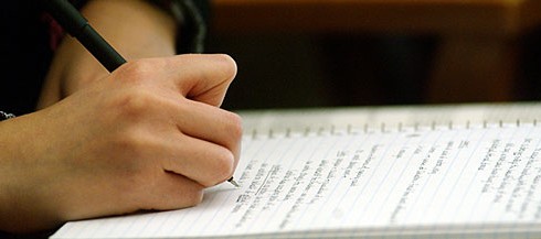 Hand writing in notebook