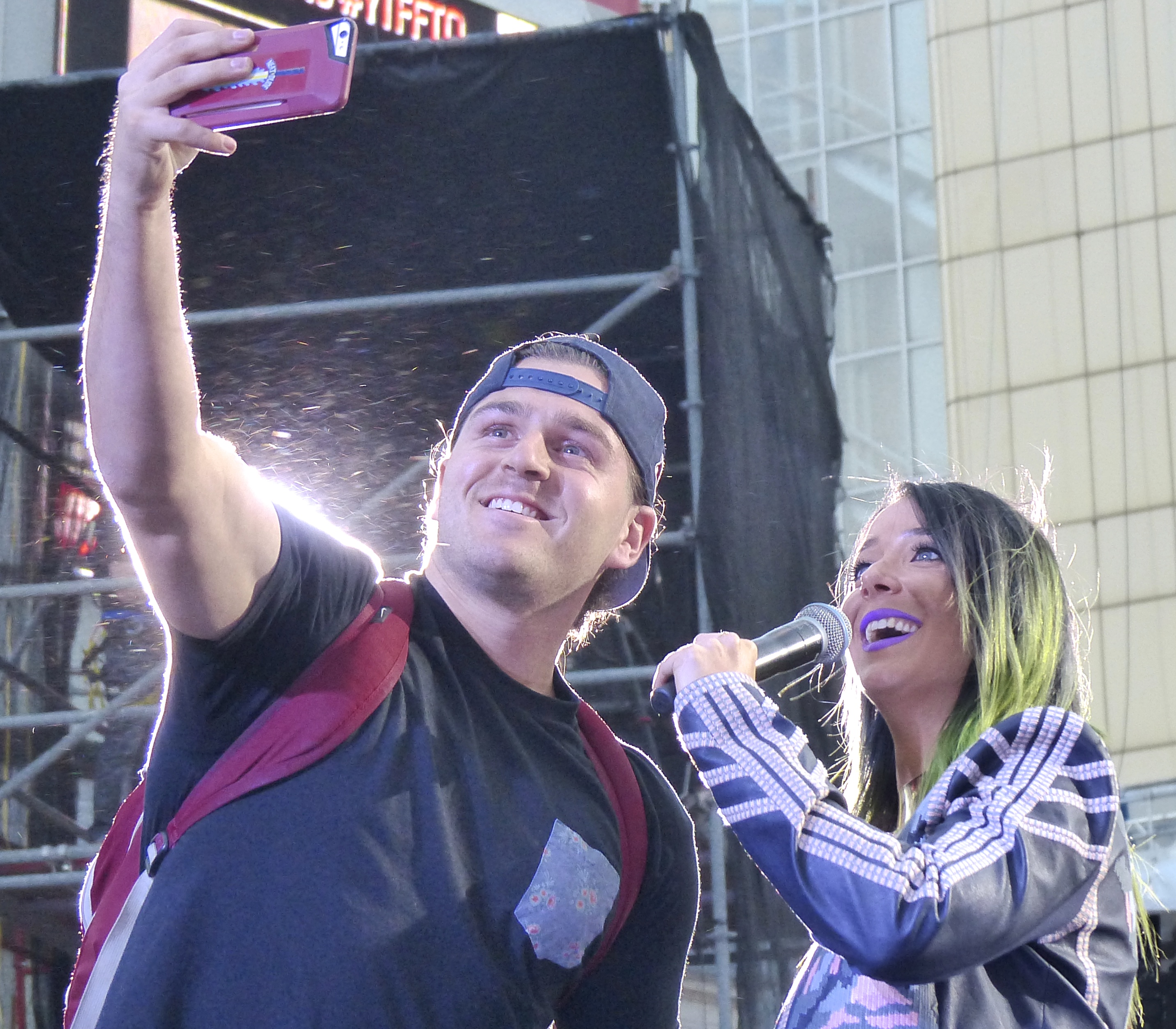 Jenna Marbles takes a selfie with the crowd