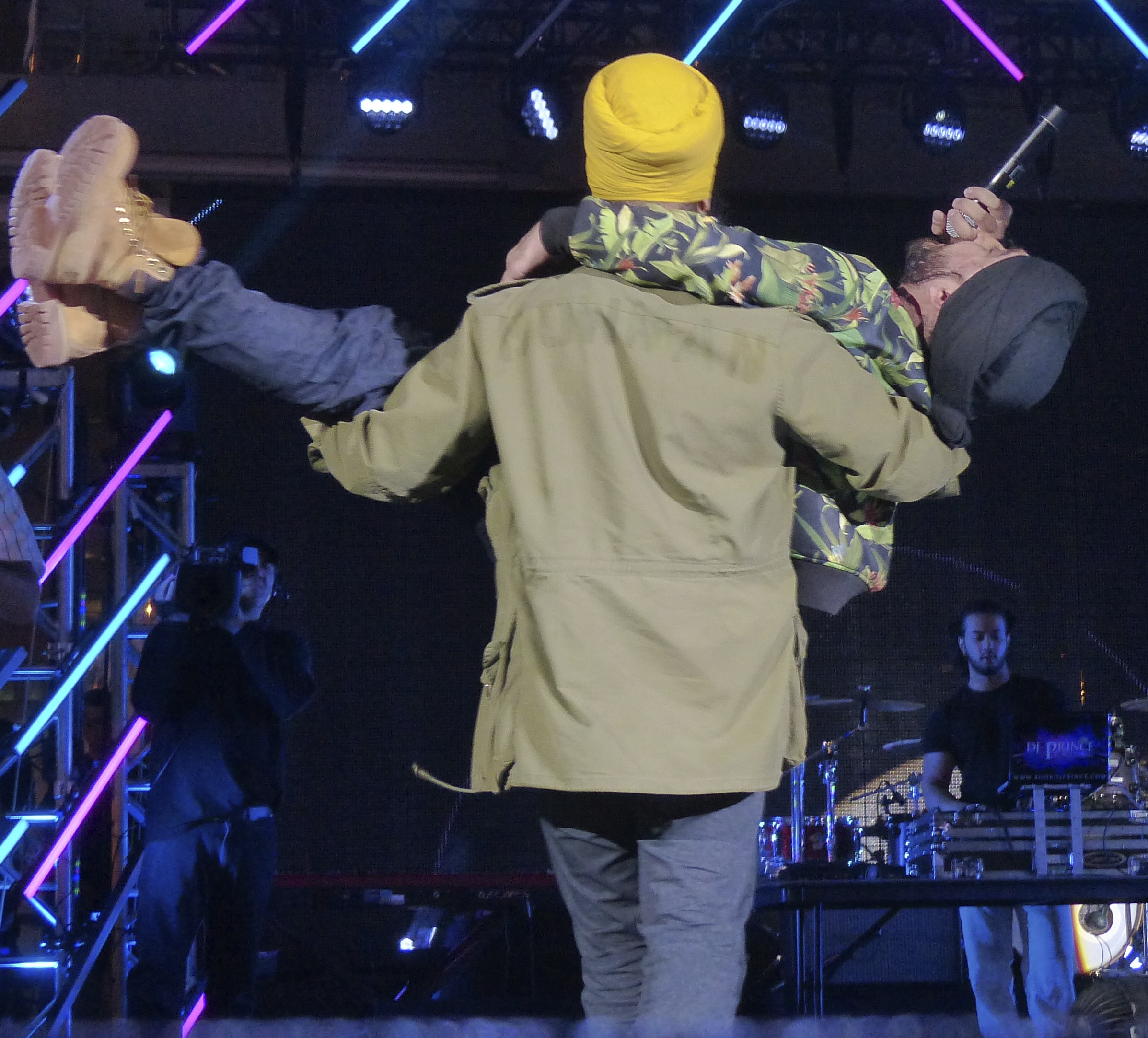 Jus Reign being carried off stage