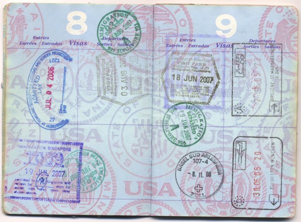 USA_passport_with_immigration_stamps_from_Austria,_Germany,_Singapore_and_the_US_-_20120708