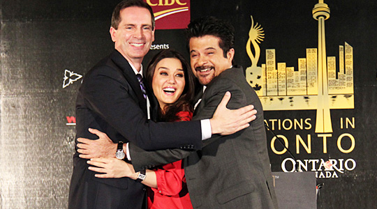 IIFA Awards in Toronto Preity Zinta and Anil Kapoor hug Dalton McGuinty