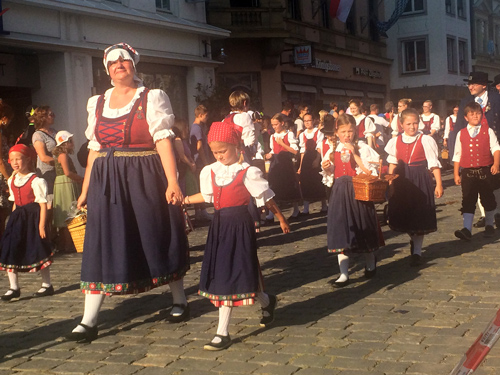 Locals from Straubing walking through the city during the Gäuboden Festival