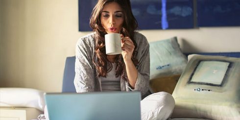 woman coffee internet usage laptop