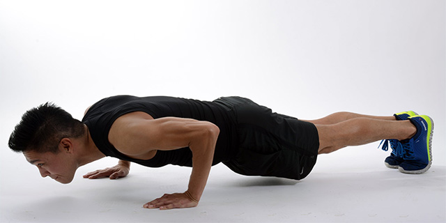 working out pushup plank