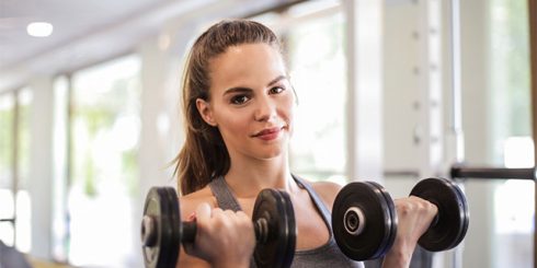 woman working out fitness weights