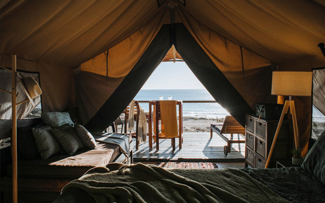 vacation beach tent escape the world