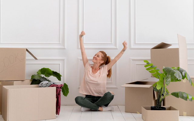 young woman is moving into her first apartment in Toronto